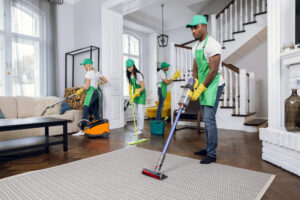 Commercial cleaners cleaning home