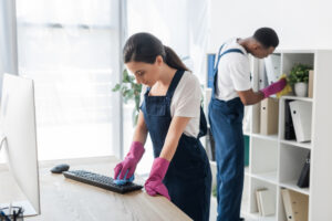 Office cleaning company staff working