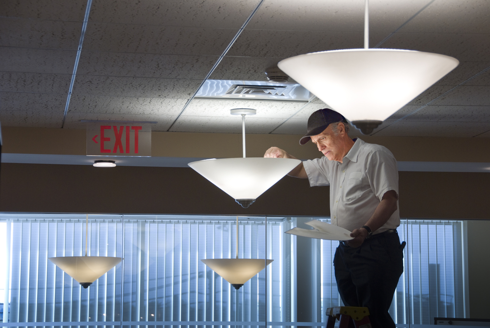 Man performing light maintenance